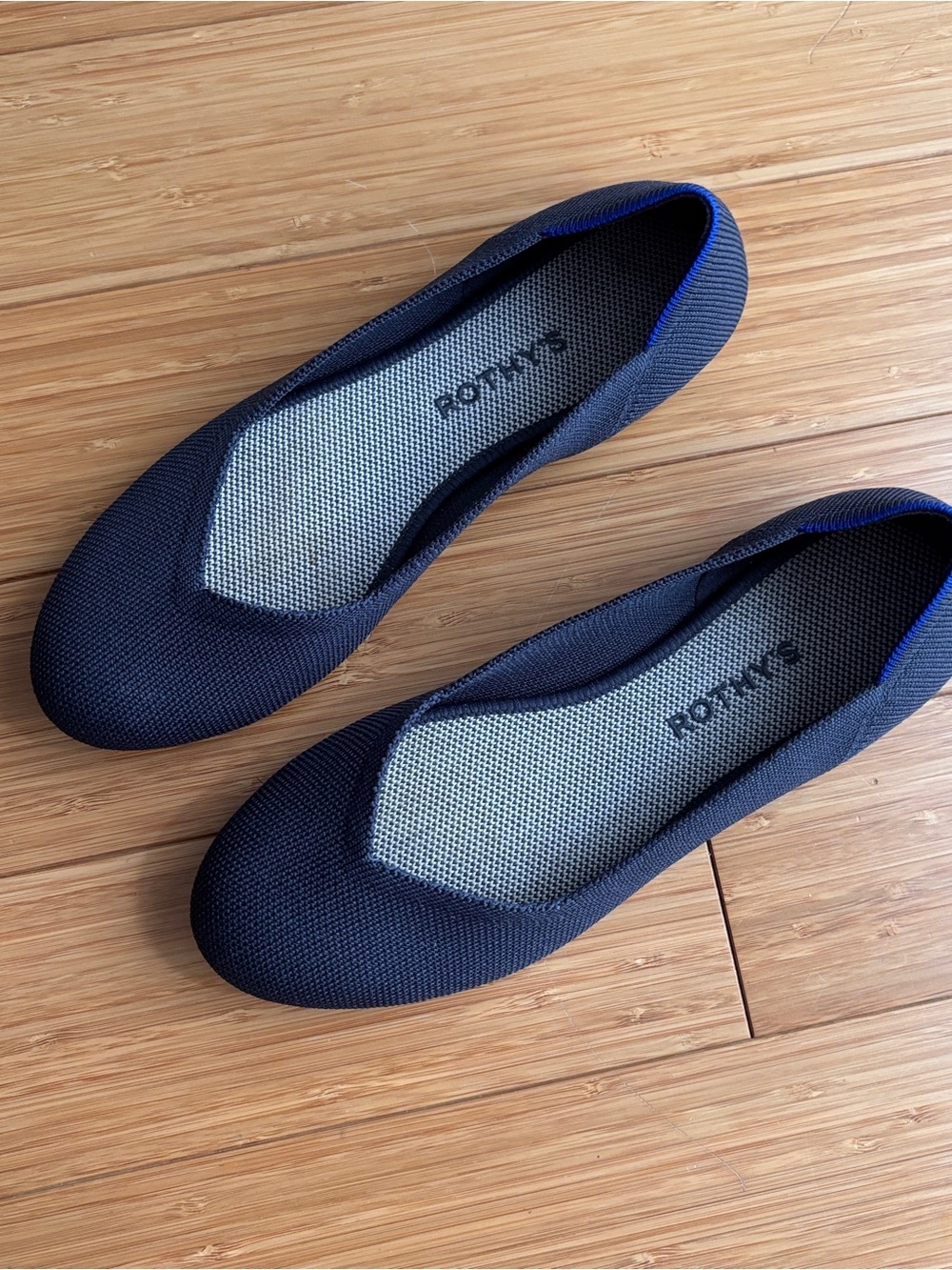 Rothy's round toe navy blue ballet flats with textured knit fabric